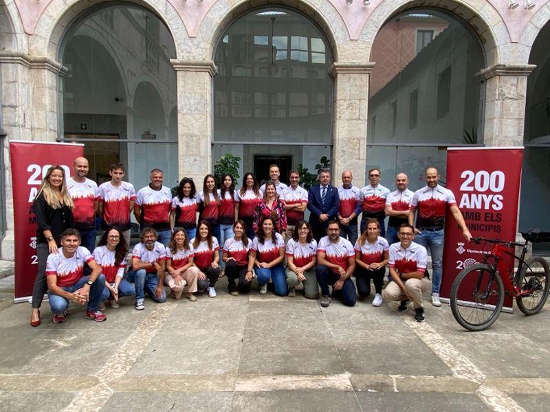 Fotografia amb els participants a les curses solidàries. Pati de la Diputació de Girona, 27 de setembre del 2022